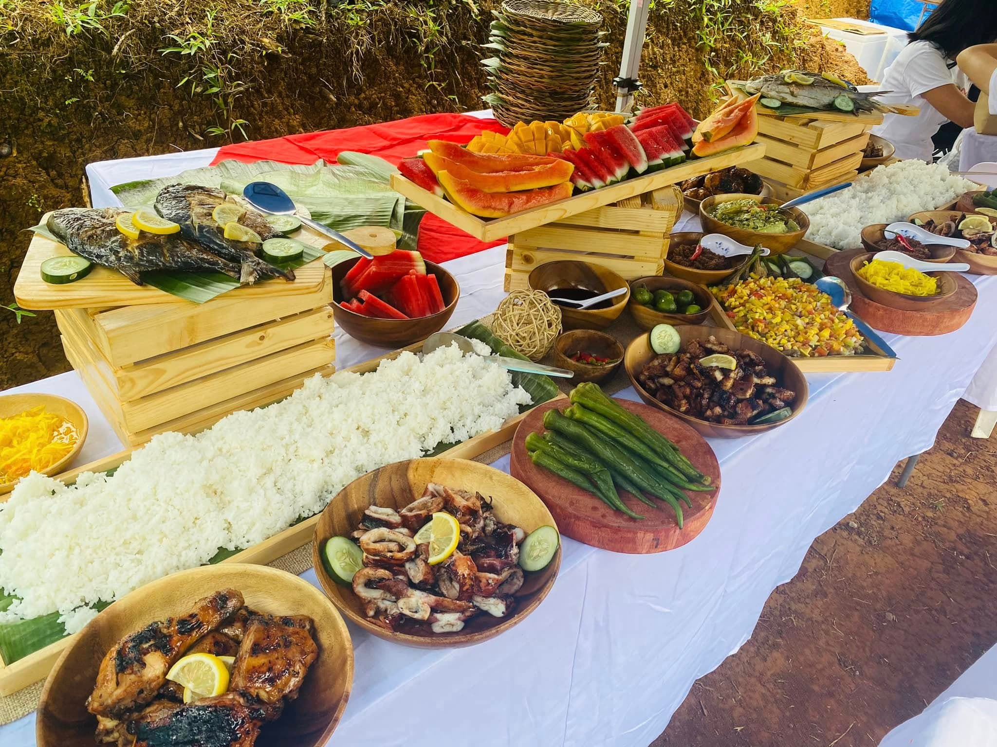 An abundant Filipino feast arranged for sharing