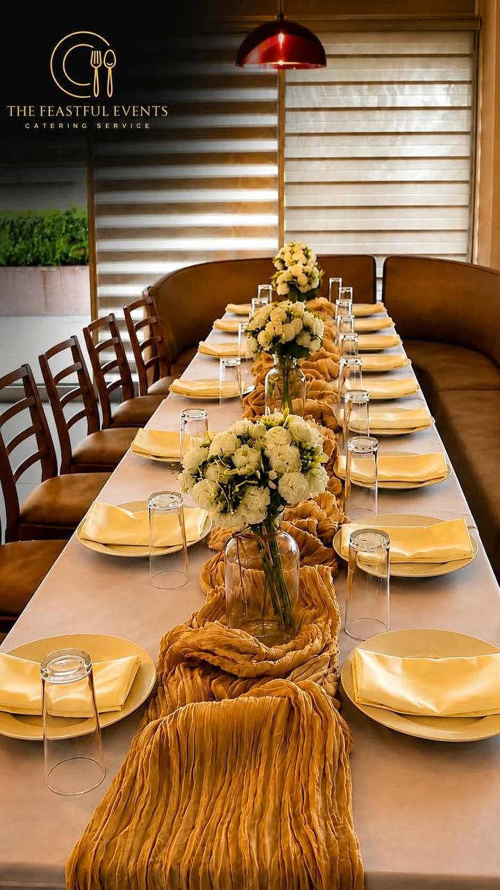 Elegant gold table setting prepared by The Feastful Events